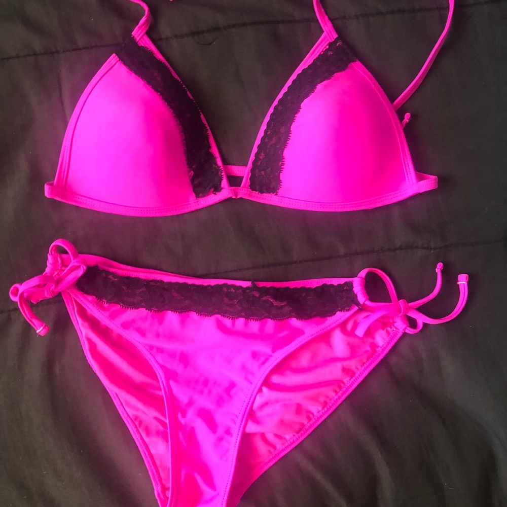 Hot pink push up custom bikini with black lace .